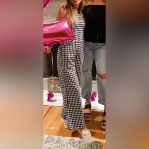 Gingham jumpsuit with front pockets size small worn once